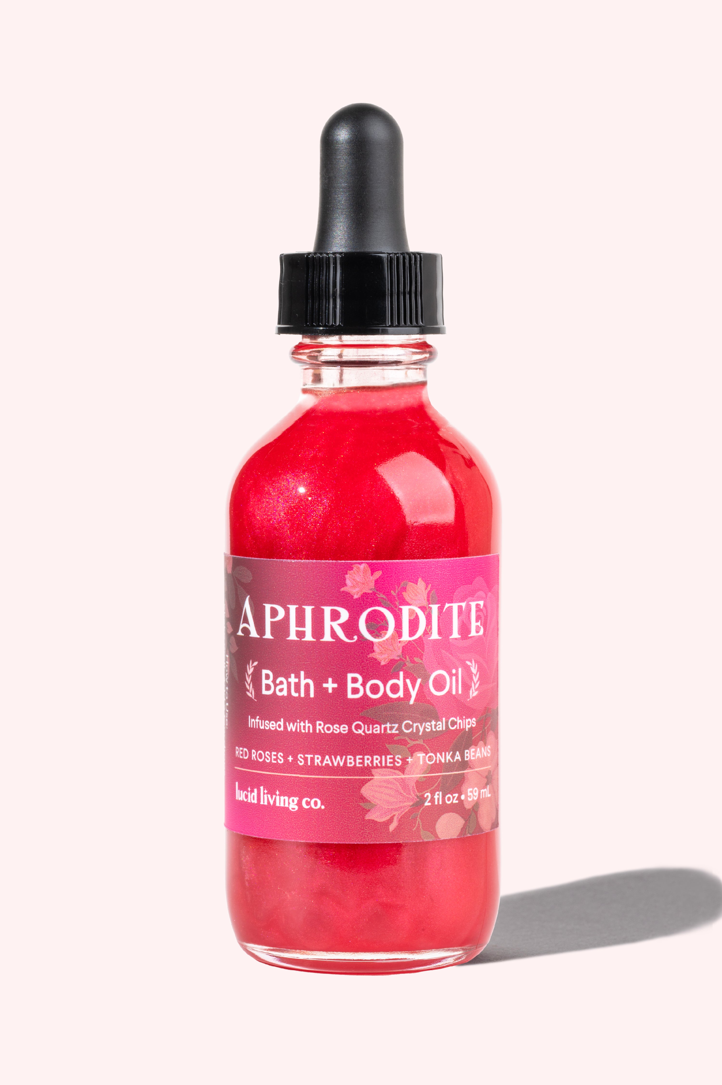 Velvet Love Bundle Aphrodite Bath and Body Oil in red with black dropper and floral label on white background