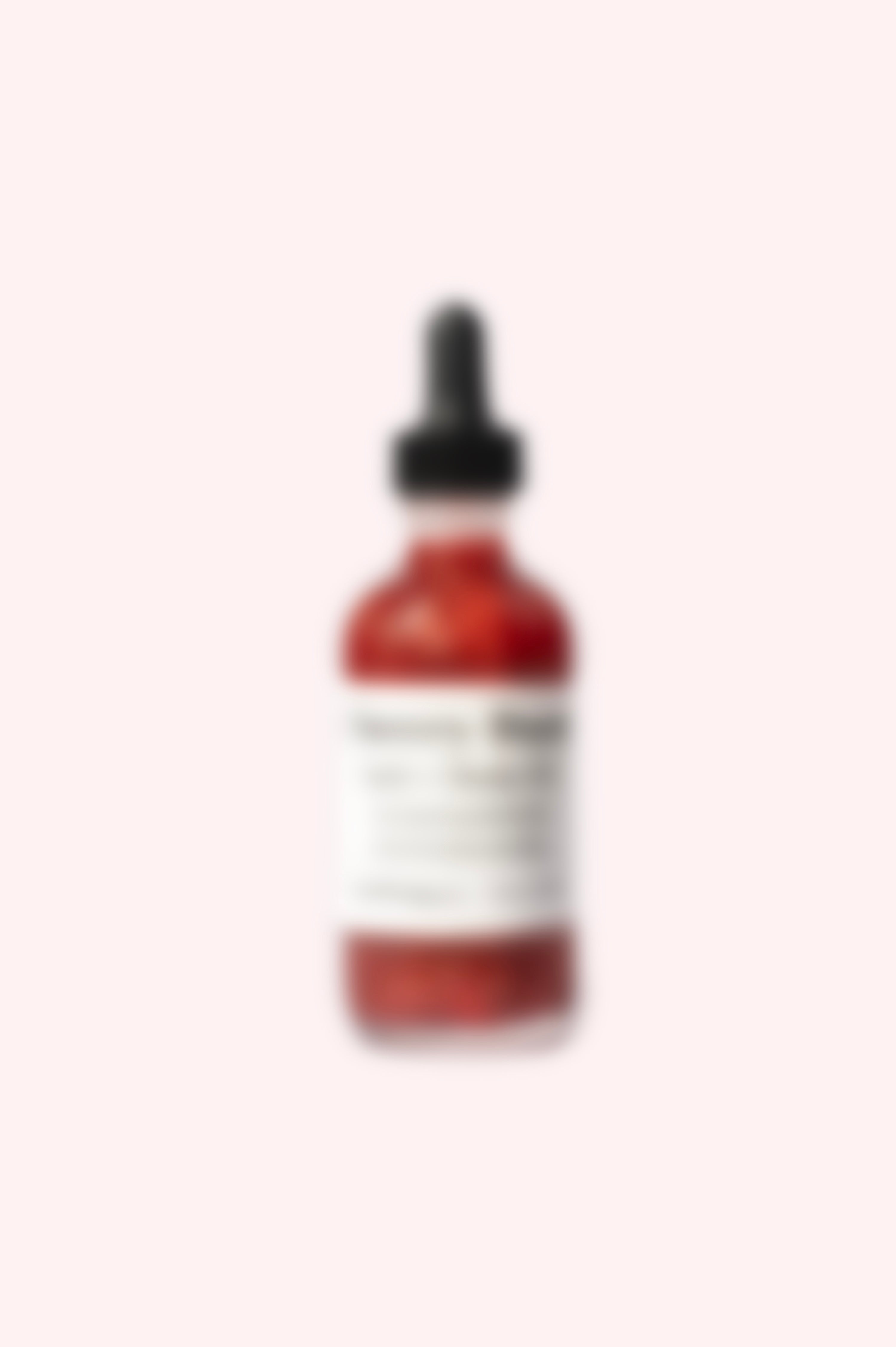 Bottle with a dropper on a white background