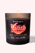 Lilith Soy Candle lit in black frosted glass with vanilla, frosted berries, and clove scent by Lucid Living Co.