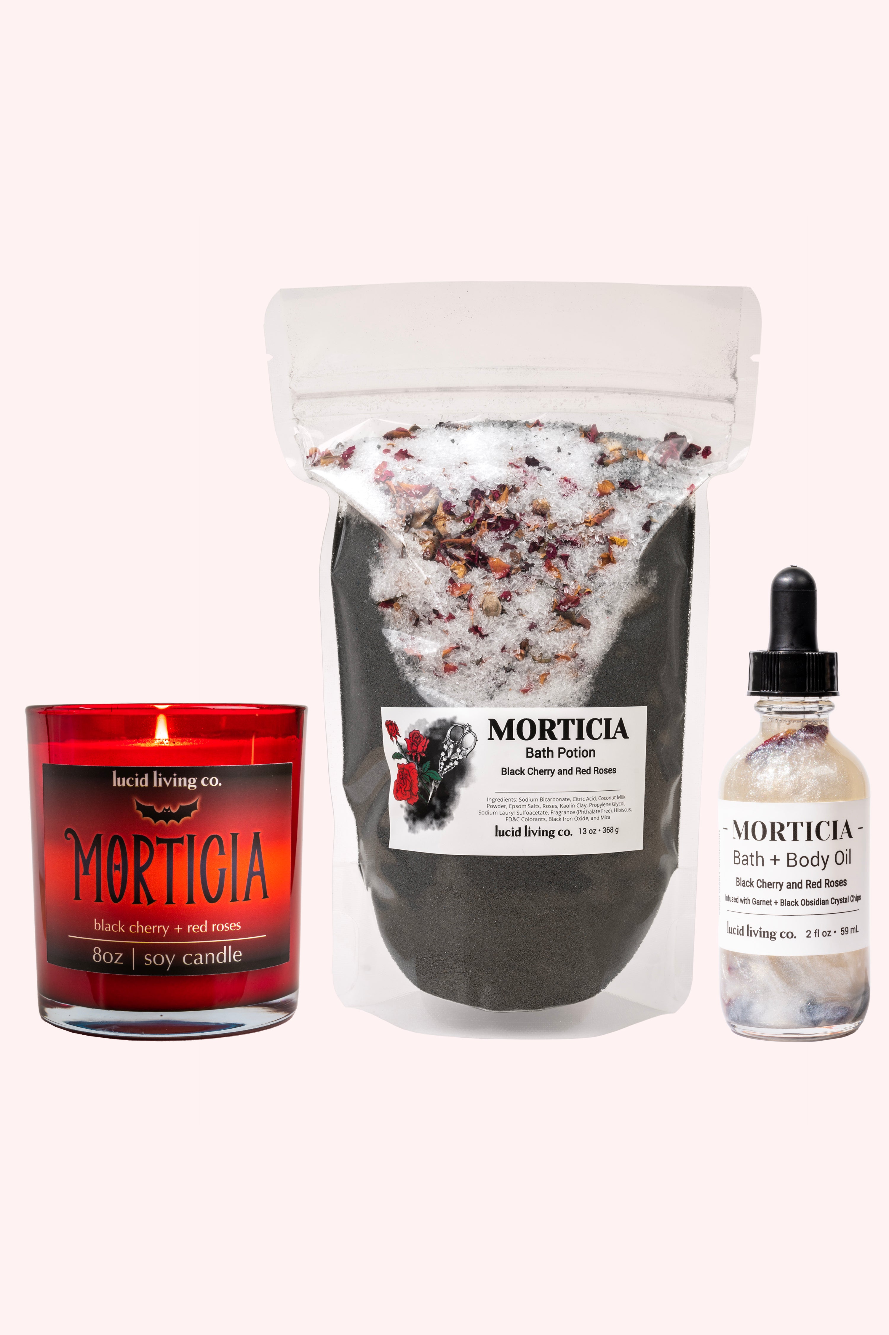 MORTICIA Bundle with black cherry bath potion, calming candle, and bath plus body oil for fall relaxation.