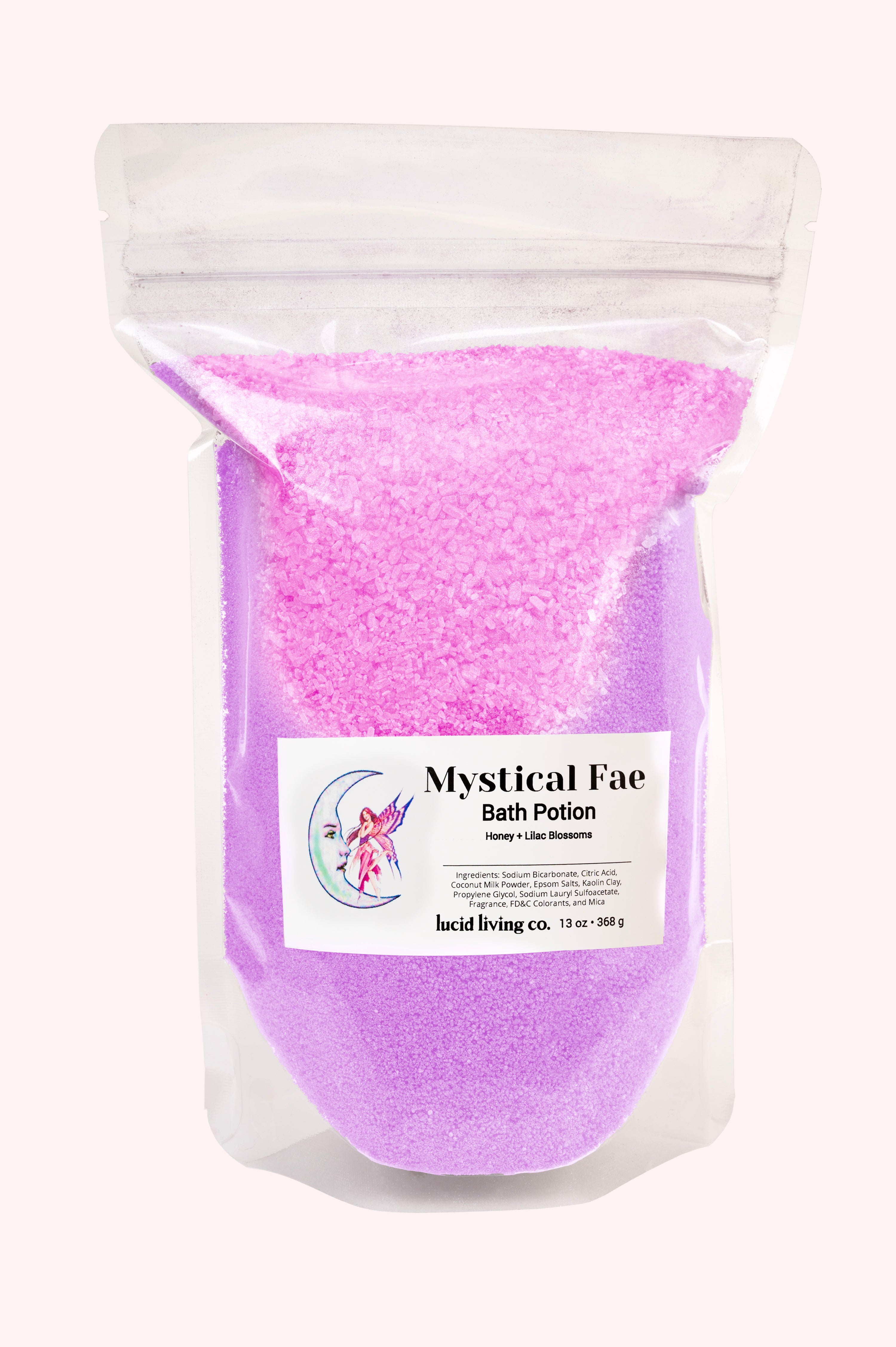 Mystical Fae Bath Potion in resealable pouch with pink and purple bath salts scented with honey and lilac blossoms.
