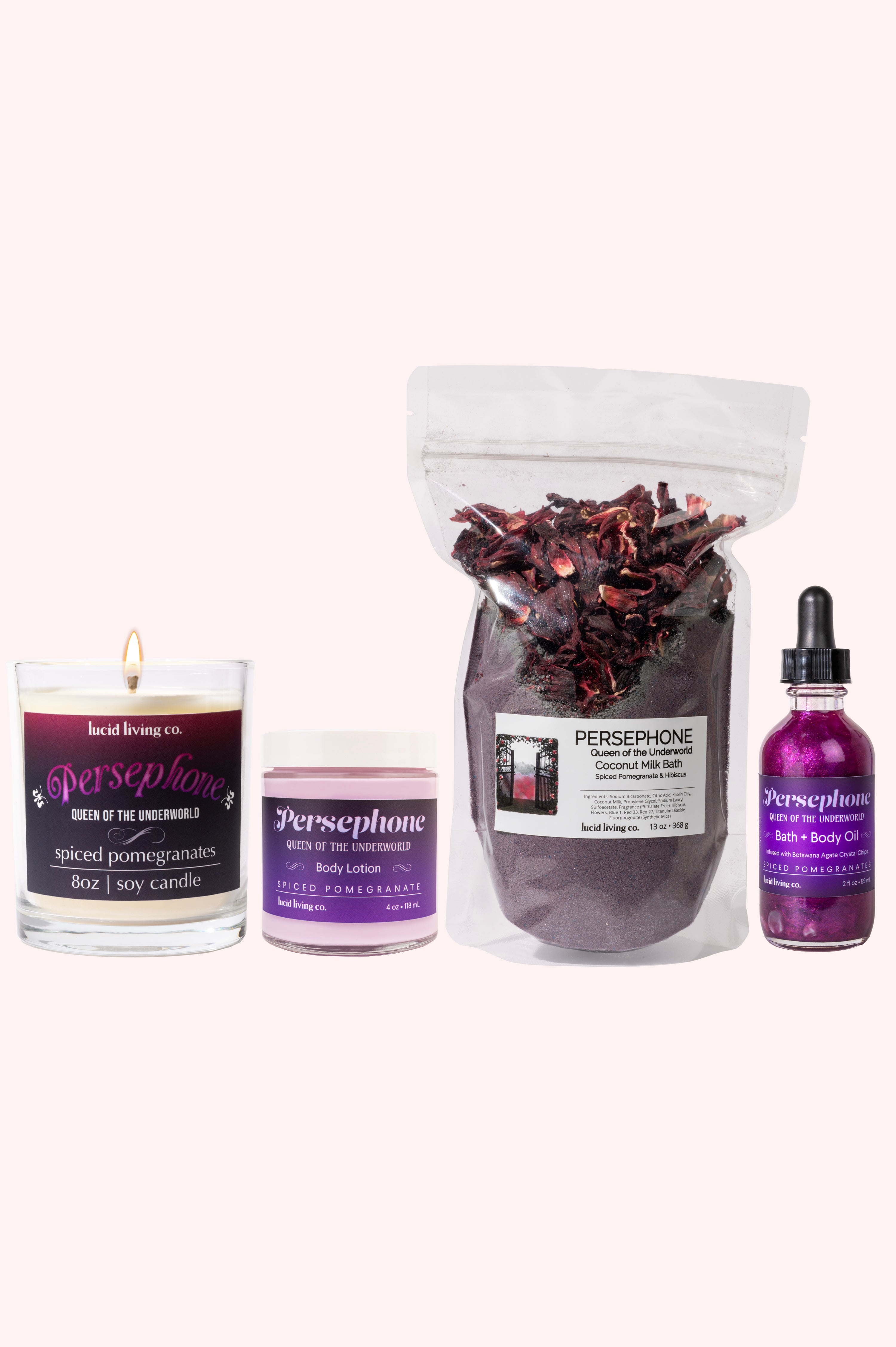 Persephone Bundle with spiced pomegranate candle, body lotion, coconut milk bath, and bath body oil.