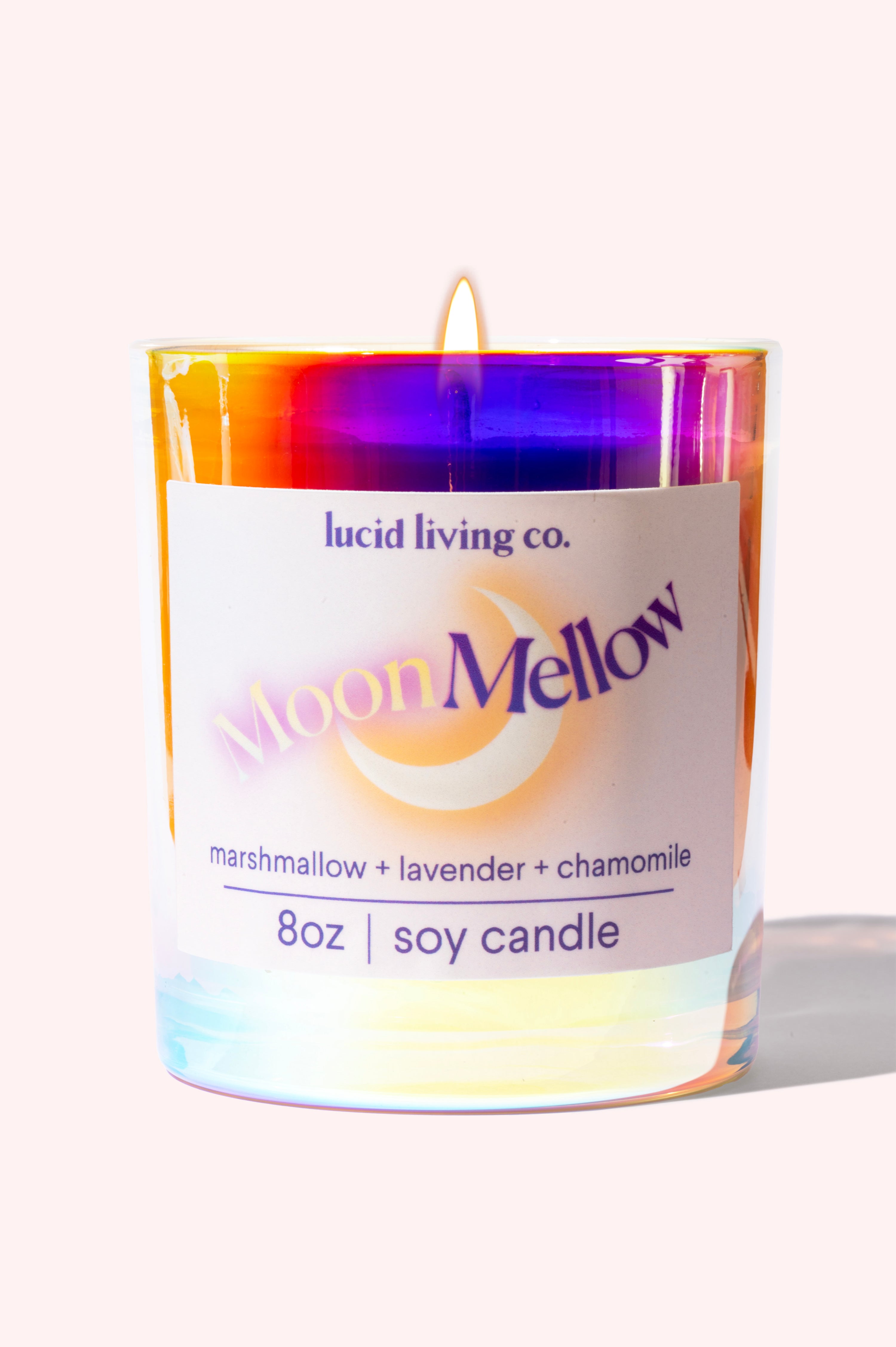 MoonMellow Soy Candle with whipped marshmallow, lavender, and chamomile fragrance in a colorful glass jar.