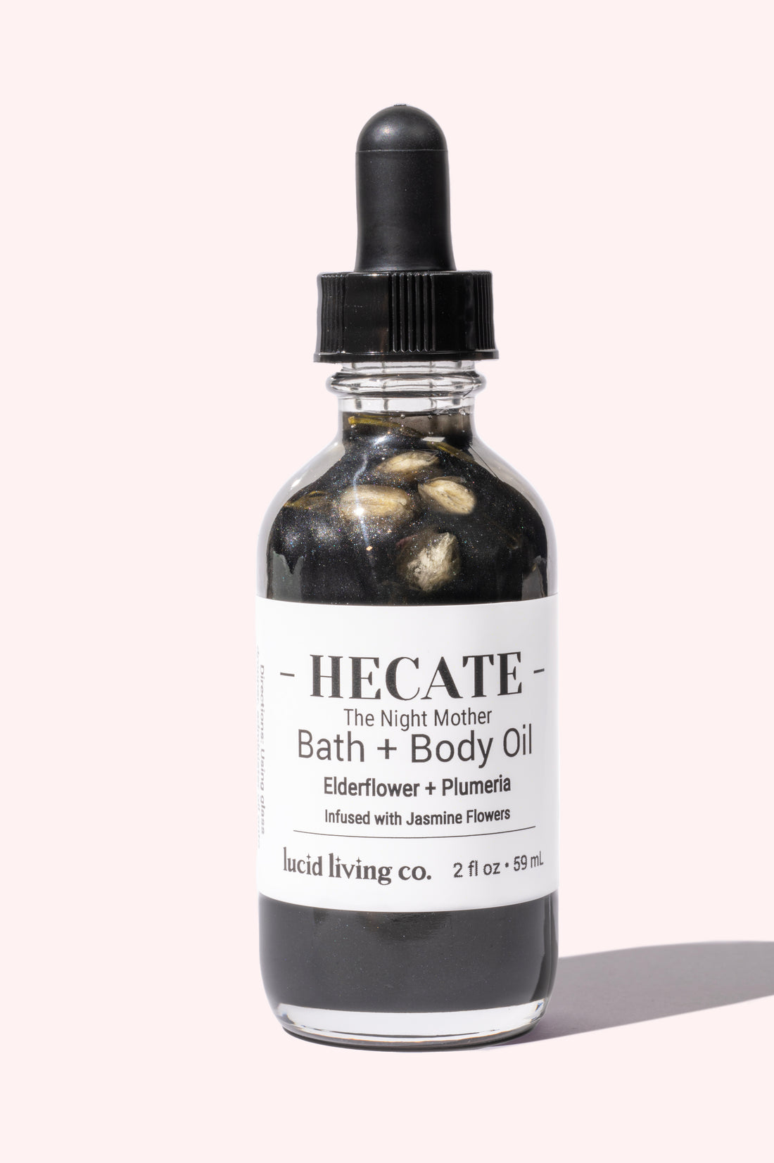 HECATE The Night Mother Bath &amp; Body Oil with elderflower and plumeria for nourishing and hydrating skin glow.