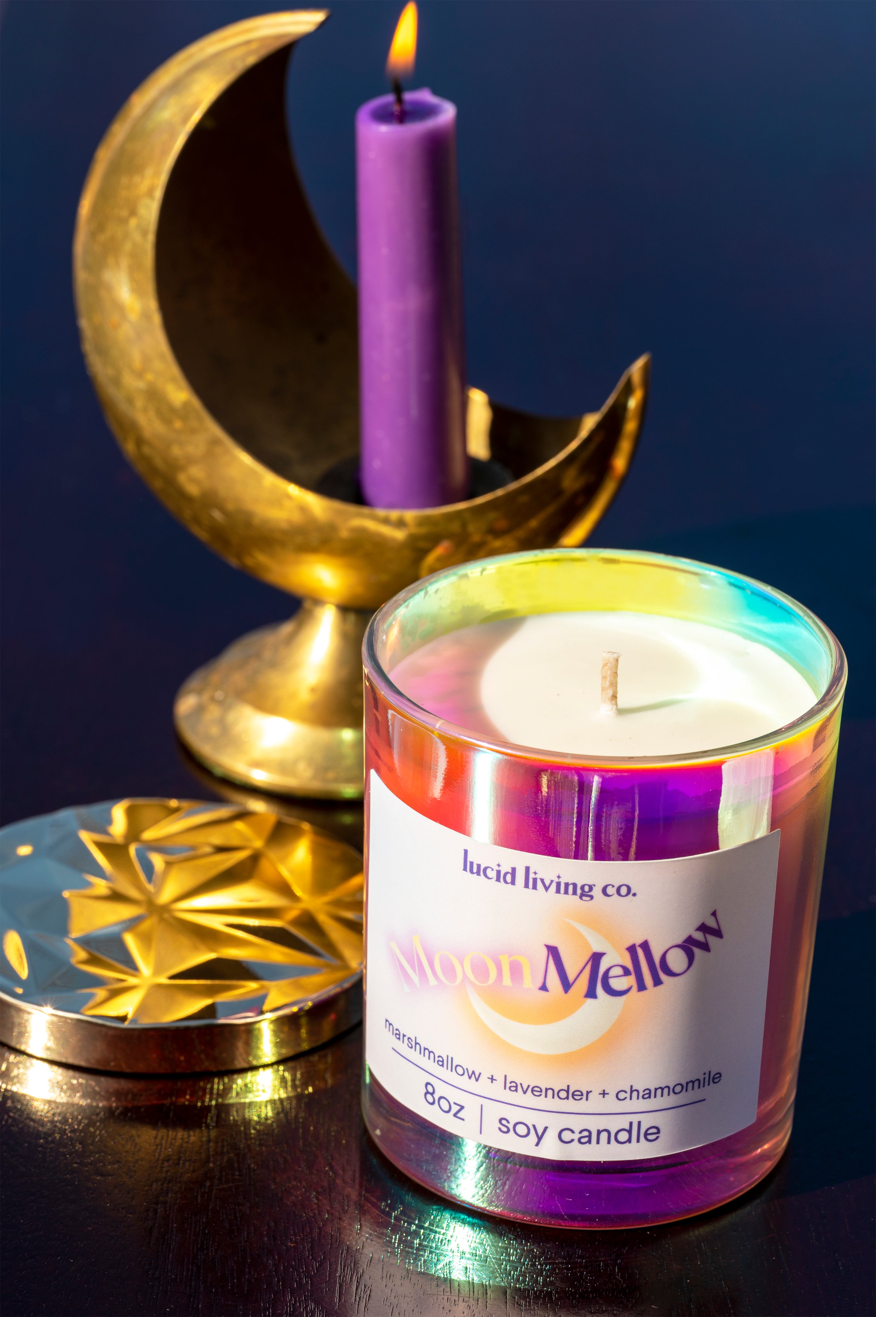 MoonMellow Soy Candle with whipped marshmallow, lavender, and chamomile scent in iridescent glass jar.